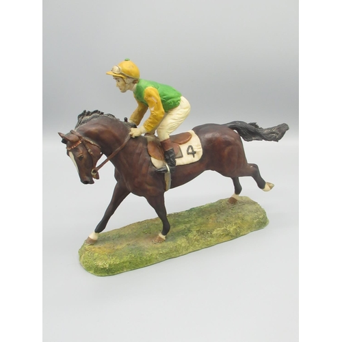 110 - Frazer Hines Collection - Beswick horse and jockey taking a fence, H22.5cm