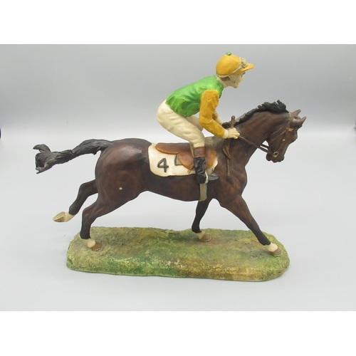 110 - Frazer Hines Collection - Beswick horse and jockey taking a fence, H22.5cm