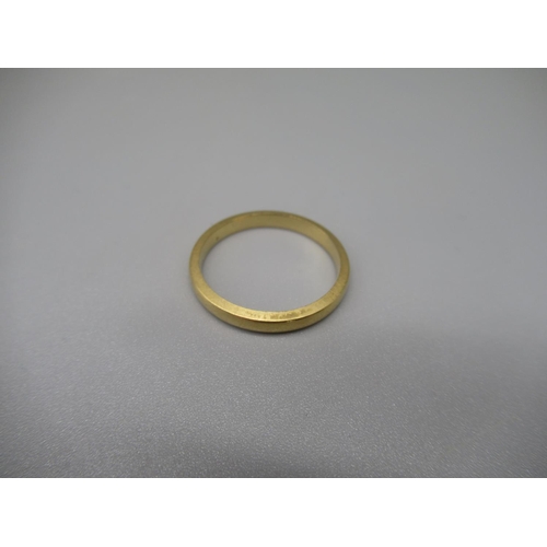 59 - 18ct plain yellow gold wedding band, size Q1/2, 3.8g
