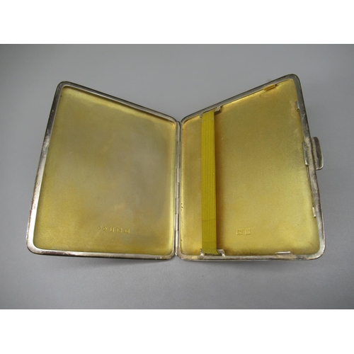 83 - ER.II hallmarked Sterling silver cigarette case with engine turned detail and gilded interior, by Fr... 