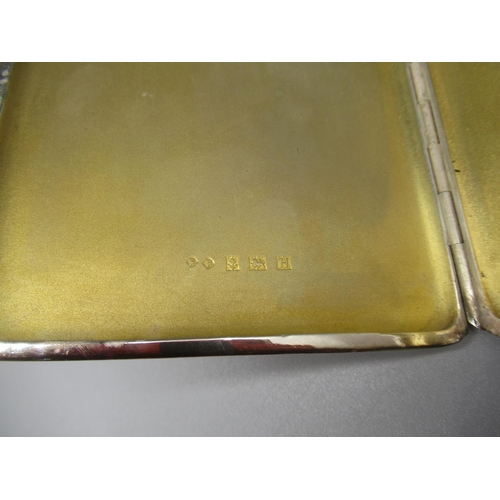 83 - ER.II hallmarked Sterling silver cigarette case with engine turned detail and gilded interior, by Fr... 