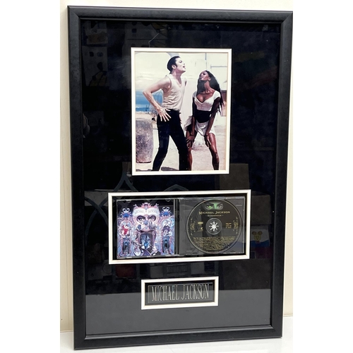 840 - Michael Jackson framed 'Dangerous' CD and signed photo of Michael Jackson, 45.4cm x 69.8cm, with Cer... 