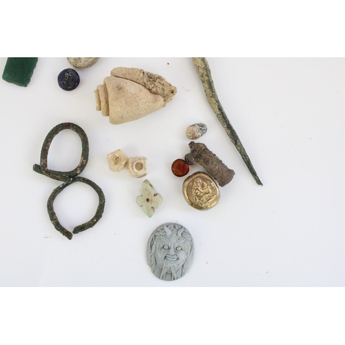 767 - Selection of Cypriot Greco-Roman and earlier small antiquities incl. spindle whorls, silver spirals,... 