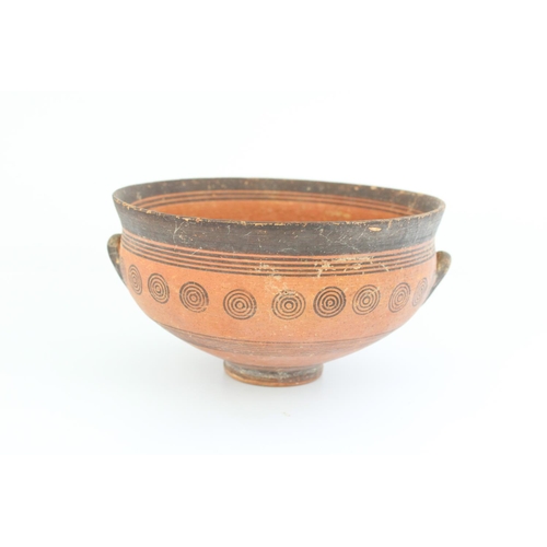 769 - Cypriot Cypro-Archaic period terracotta skyphos, black border with concentric circle decoration, H9.... 