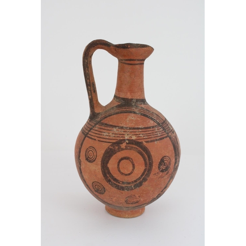 771 - Cypriot Cypro-Archaic period terracotta juglet, black border with concentric circle decoration, H16c... 