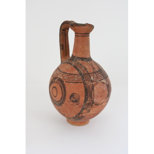 771 - Cypriot Cypro-Archaic period terracotta juglet, black border with concentric circle decoration, H16c... 