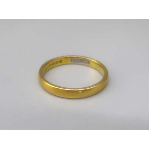 71 - 22ct yellow gold plain wedding band, stamped 22, size P1/2, 4.0g