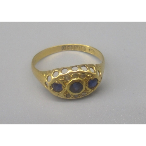 75 - 18ct yellow gold diamond and blue stone gypsy ring, stamped 18, size O 1/2, 1.9g