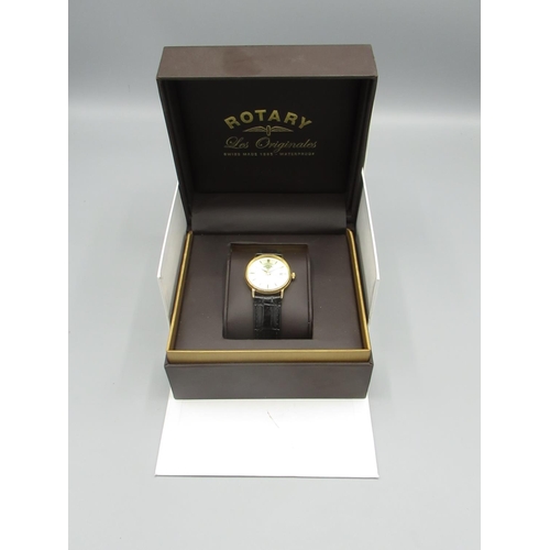 Rotary Gold Quartz Wristwatch with date signed two tone sunray dial with applied baton hour markers two piece case on original Rotary leather strap and buckle, screw off case back stamped 9K gold and 375 in original outer sleeve box