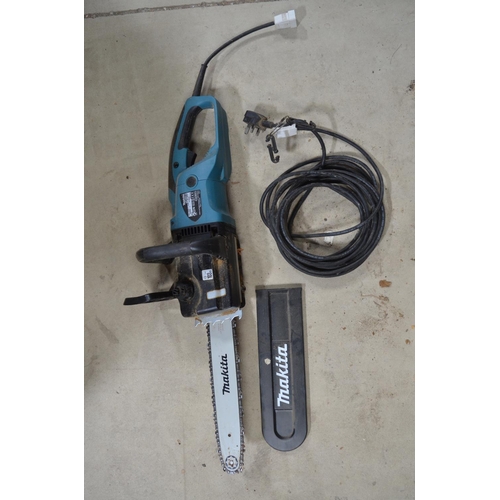 1390 - Corded Makita UC3551A chain saw with extension cable