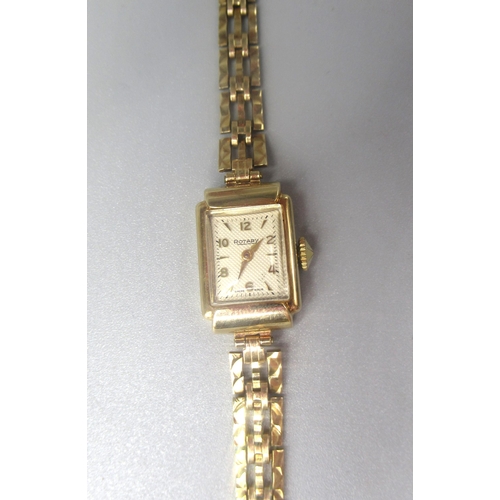 49 - Ladies Rotary gold cased wristwatch on matching gate style bracelet, signed silvered dial, two piece... 