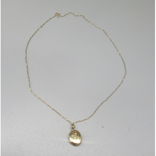 64 - 9ct yellow gold pendant locket with engraved detail, stamped 375, on 9ct yellow gold chain, stamped ... 