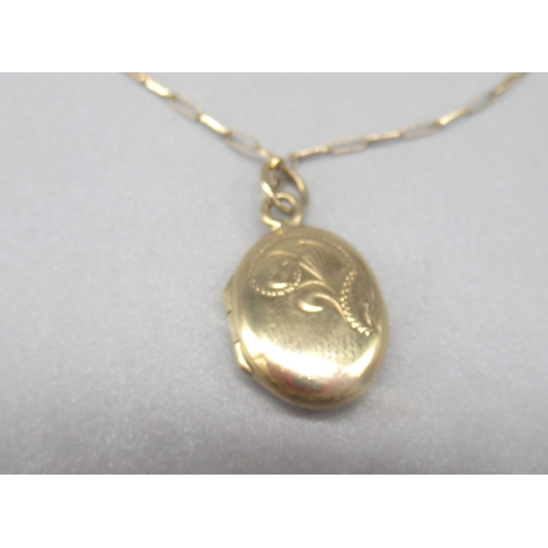 64 - 9ct yellow gold pendant locket with engraved detail, stamped 375, on 9ct yellow gold chain, stamped ... 