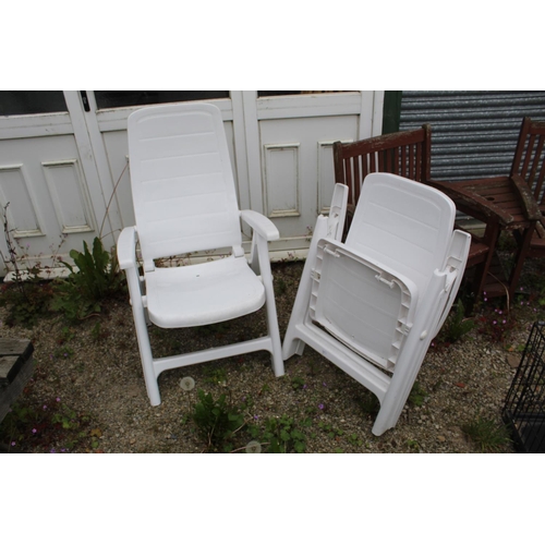 1455 - Pair of white plastic garden recliners with cushions