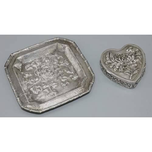 1130 - Early C20th Chinese silver heart shaped pill box with hinged cover, all over decorated with prunus, ... 