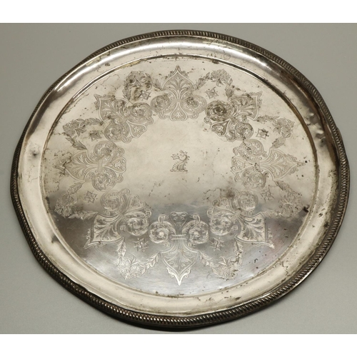 1200 - Early C20th Chinese silver circular tray, decorated to centre with scrolls and foliage around a drag... 