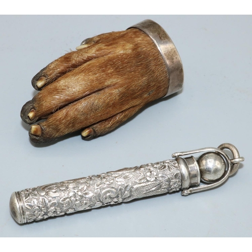 1138 - George V hallmarked silver mounted otter paw brooch, initialed B.R by Grey & Co Chester 1921, and an... 