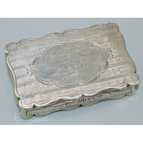 1088 - Victorian hallmarked silver shaped rectangular engine turned snuff box, hinged lid engraved 'Present... 