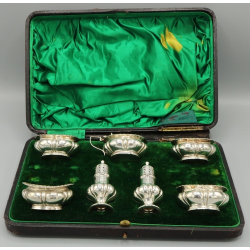 1126 - Victorian hallmarked silver seven piece cruet set, lobed bodies with gadrooned borders by Walker & H... 