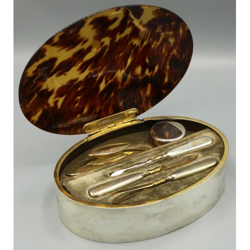 1093 - George V hallmarked silver manicure set, oval with hinged tortoiseshell lid, fitted interior with ja... 