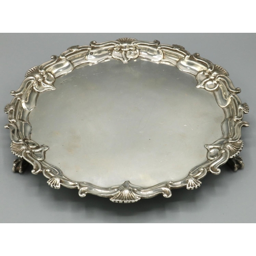 1204 - George III style hallmarked silver circular salver, with S scroll and fan raised border on claw and ... 