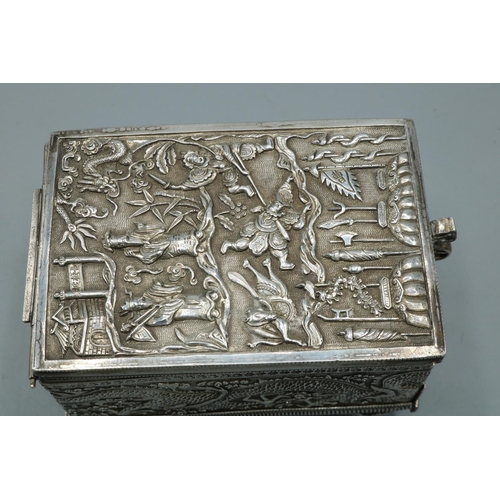 1067 - Early C20th Chinese silver rectangular jewellery box, hinged cover with interior mirror above a draw... 