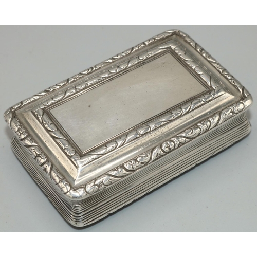 1074 - George IV hallmarked silver rectangular table snuff box, with scroll border, reeded sides and engine... 