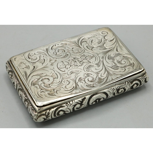 1183 - William IV hallmarked silver rectangular snuff box, repousse and engraved with scrollwork, gilt inte... 