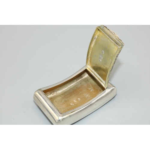 1148 - George III hallmarked silver curved rectangular snuff box, plain with gilt interior and inset hinge,... 