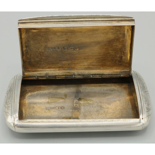 1150 - Victorian hallmarked silver rounded rectangular snuff box, engine turned with scroll end detail, hin... 