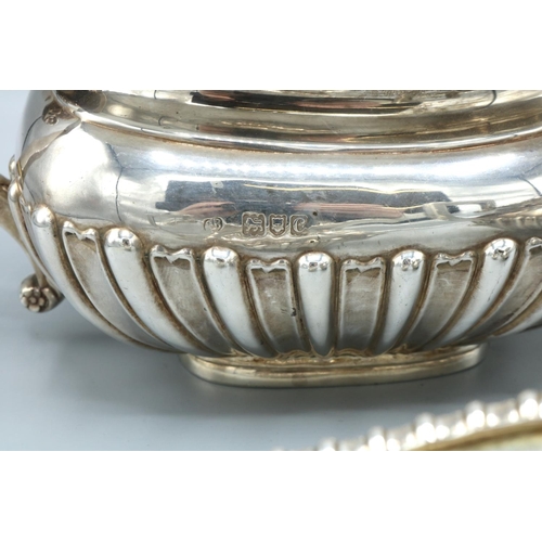 1052 - Victorian hallmarked silver three piece tea service, lobed bodies with gadrooned borders and angular... 