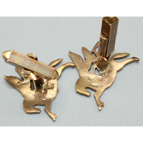 1039 - Pair of gold Pegasus and Bellerophon cuff links and matching tie pin, commissioned by a former Speci... 