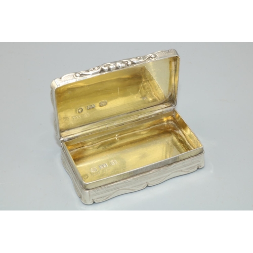 1108 - Victorian hallmarked silver shaped rectangular snuff box, plain hinged lid with vacant oval cartouch... 