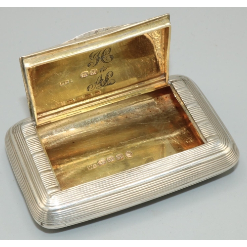 1105 - George III hallmarked silver rectangular snuff box, all over with reed banded, gilt interior with de... 