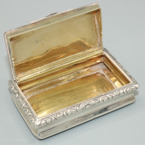 1149 - George IV hallmarked silver rectangular snuff box, engine turned with scroll cast edge, hinged lid w... 