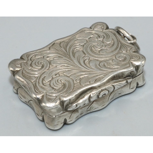 1134 - William IV hallmarked silver shaped rectangular small vinaigrette, hinged cover with a vacant cartou... 