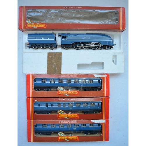 64 - Hornby OO gauge R685 LMS 4-6-2 Coronation Class 7P with 3 Coronation Scot coaches (2x R422 1st Class... 