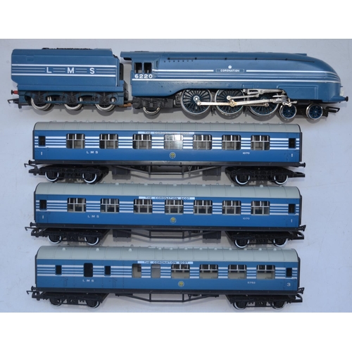 64 - Hornby OO gauge R685 LMS 4-6-2 Coronation Class 7P with 3 Coronation Scot coaches (2x R422 1st Class... 