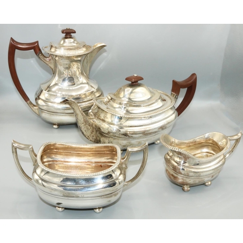 1201 - George.VI hallmarked silver four piece tea service, ovoid bodies with gadrooned rims on ball feet, m... 