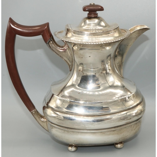 1201 - George.VI hallmarked silver four piece tea service, ovoid bodies with gadrooned rims on ball feet, m... 