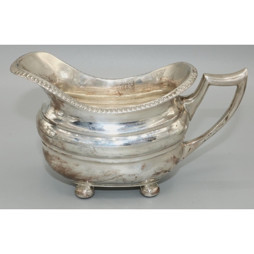 1201 - George.VI hallmarked silver four piece tea service, ovoid bodies with gadrooned rims on ball feet, m... 