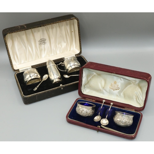 1171 - Pair of Victorian hallmarked silver circular salts, repouse with scrolls, makers mark JJ, London 189... 