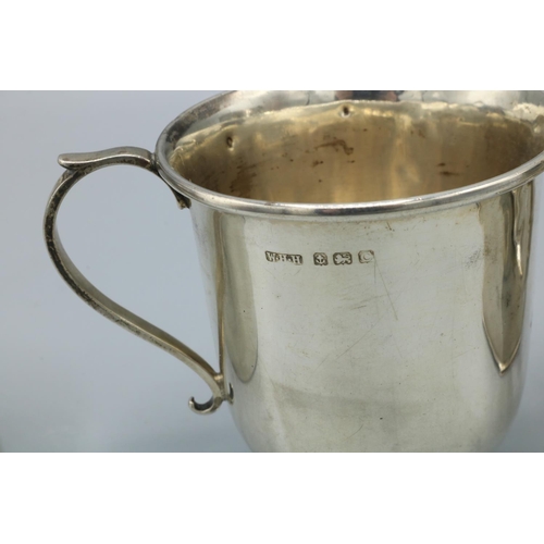 1124 - Edward VII hallmarked silver Christening mug, Sheffield 1904, another Birmingham 1908 and a George V... 