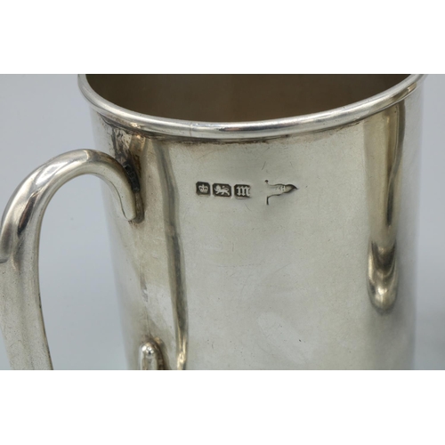 1124 - Edward VII hallmarked silver Christening mug, Sheffield 1904, another Birmingham 1908 and a George V... 