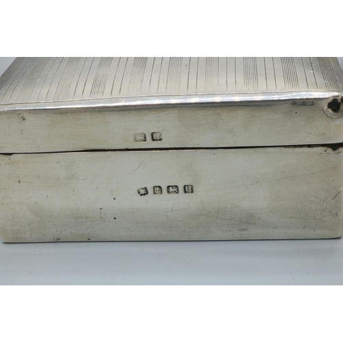 1193 - George V hallmarked silver rectangular table cigar box, stepped hinged lid with engine turned bands,... 