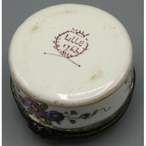 1223 - C19th French white enamel circular box, gilt metal mounted hinged lid painted with lovers in a garde... 