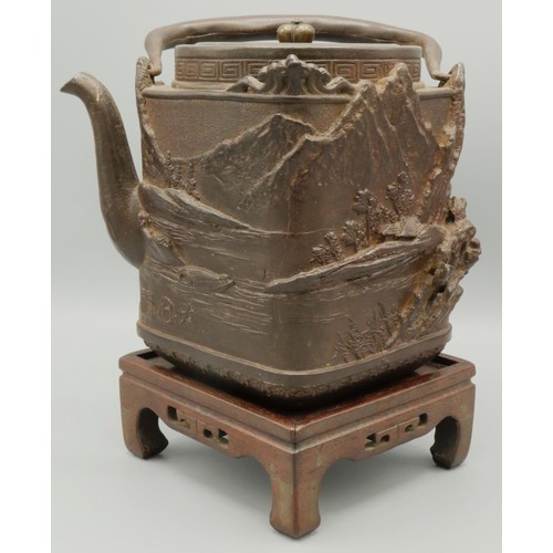 1264 - Japanese Meiji period cast iron Tetsubin or kettle, square body decorated in high relief with mounta... 