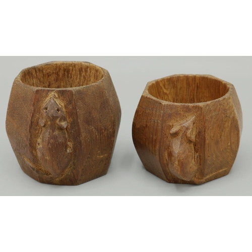 1424 - Robert Mouseman Thompson of Kilburn - two octagonal oak napkin rings, both carved with signature Mou... 