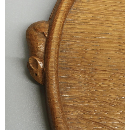 1417 - Robert Mouseman Thompson of Kilburn - an adzed oak kidney shaped galleried tray, carved with two sig... 