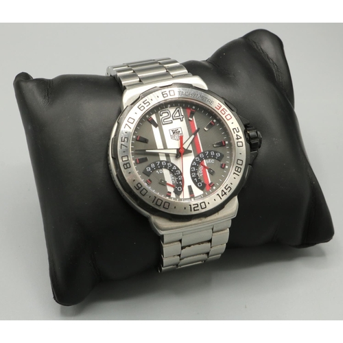 1048 - Tag Heuer Calibre S quartz 1/100th chronograph wristwatch, signed dial with subsiduary dials, stainl... 